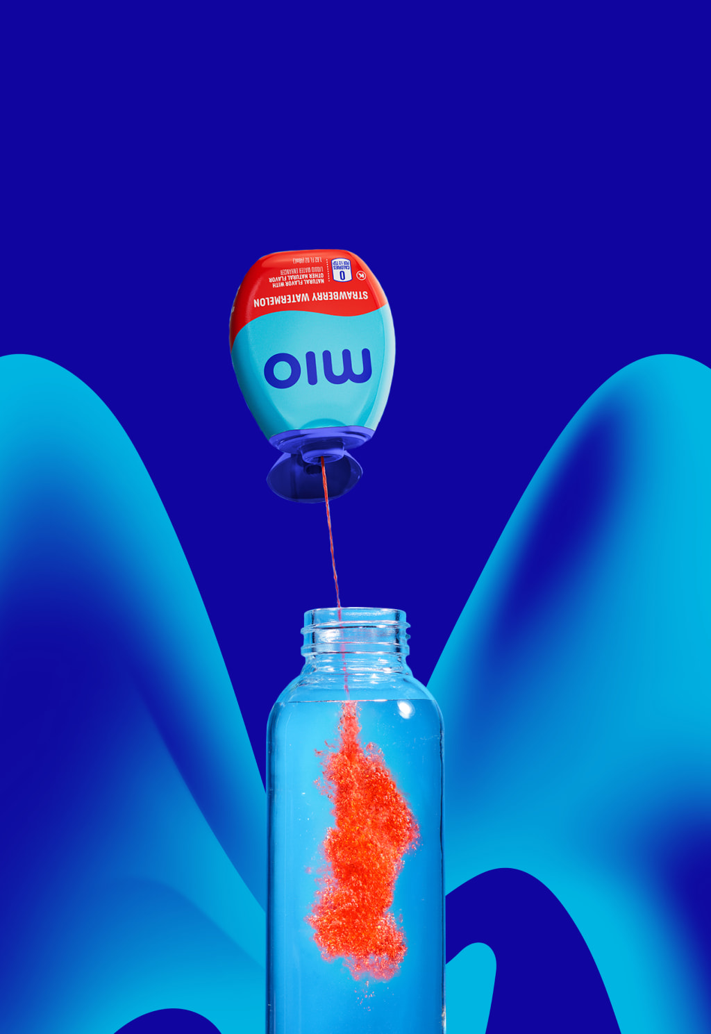 MiO Strawberry Watermelon being added to water in clear bottle.
