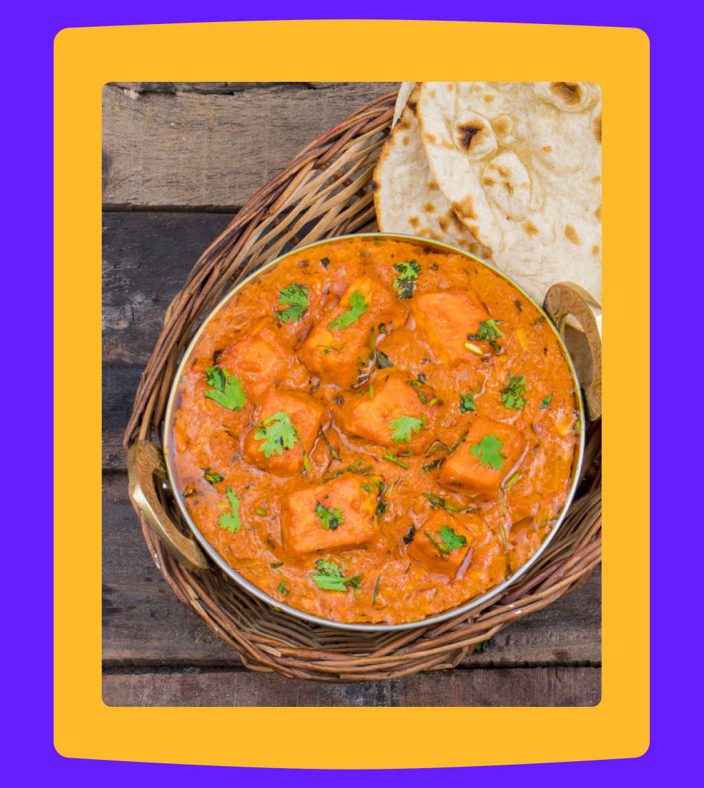 Paneer tikka masala with naan bread.