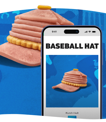 A baseball hat made of stacked lunch meat and a cracker brim.