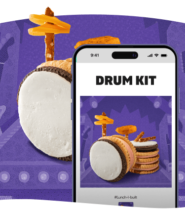 A drum set made of cookies and pretzels is displayed next to a phone showing the same image.