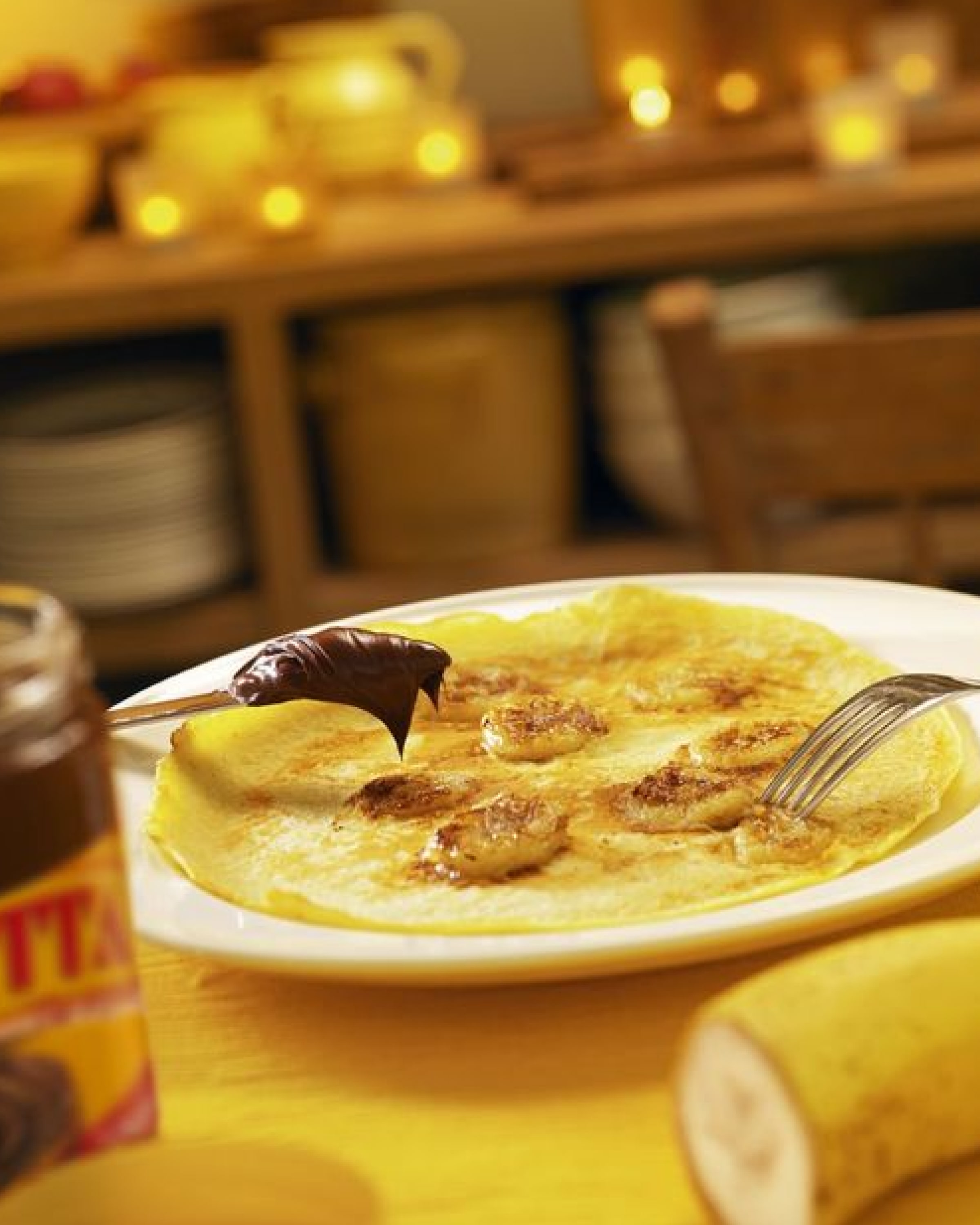 Pfannkuchen mit Banane und Schokolade.