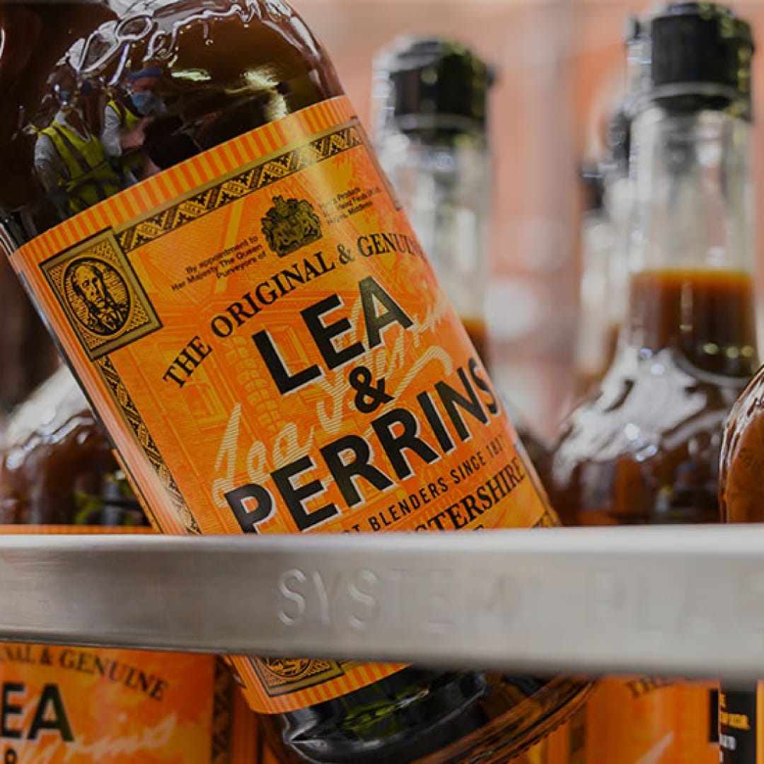 Close up on bottles in the Lea and Perrins factory.