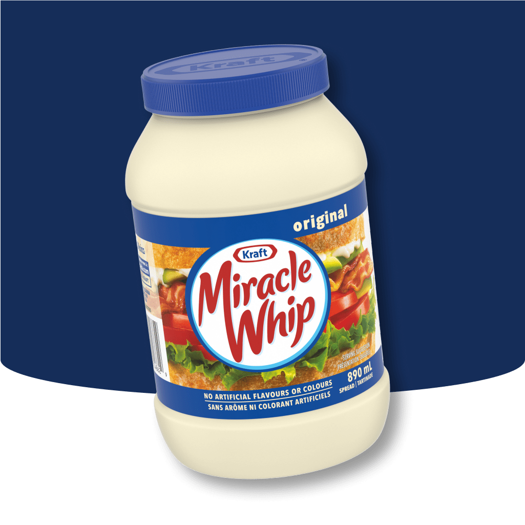 Two jars of Kraft Miracle Whip Original spread against a two-tone blue background. The jar in the foreground is in focus, sho