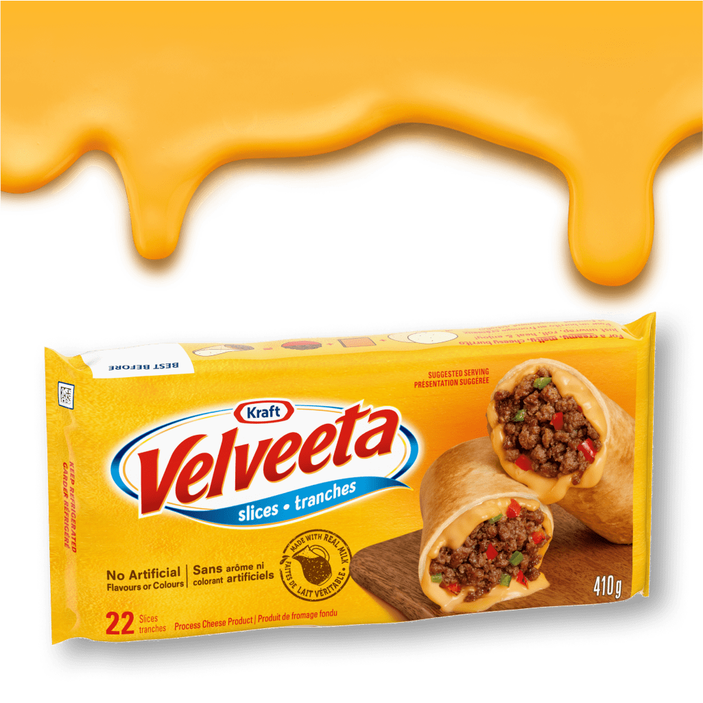 A package of Kraft Velveeta cheese slices against a background of melted cheese. The box displays an image of a cooked, chees