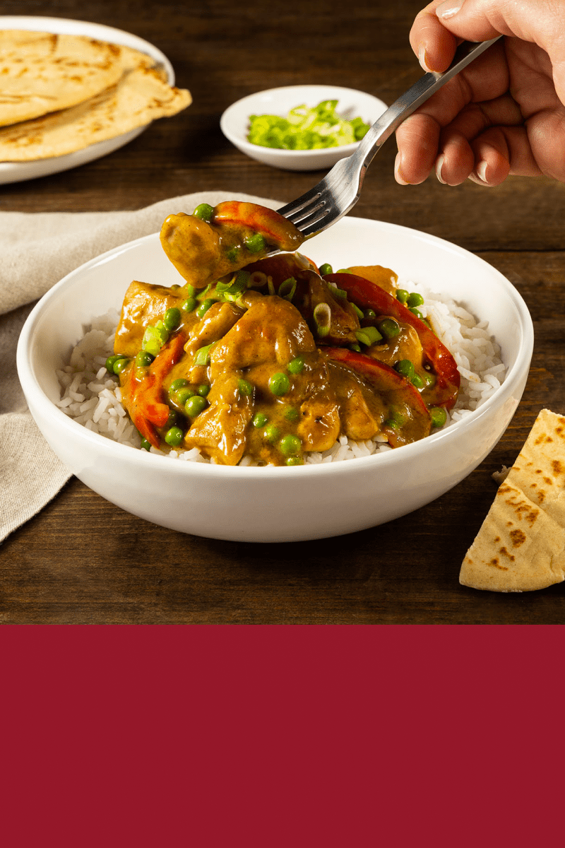 A serving of Easy Chicken Curry, a quick recipe featuring HEINZ HomeStyle Brown Gravy.