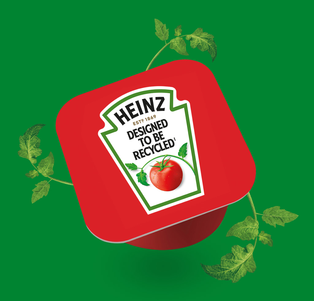 Heinz 'Designed to be Recycled' logo with tomato on green background.