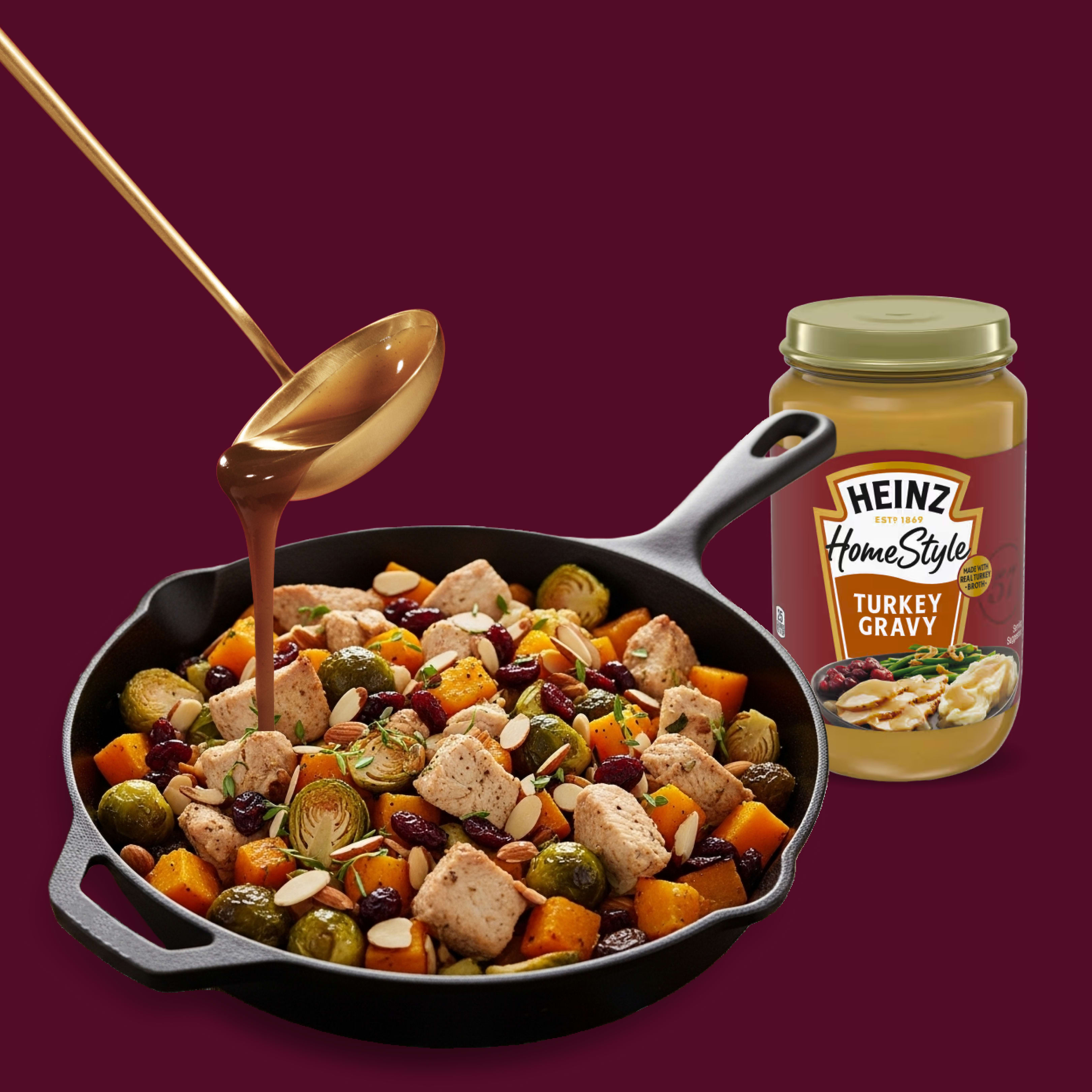 Heinz Turkey Gravy poured over a savory turkey & veggie skillet: Brussels sprouts, butternut squash, cranberries, almonds.