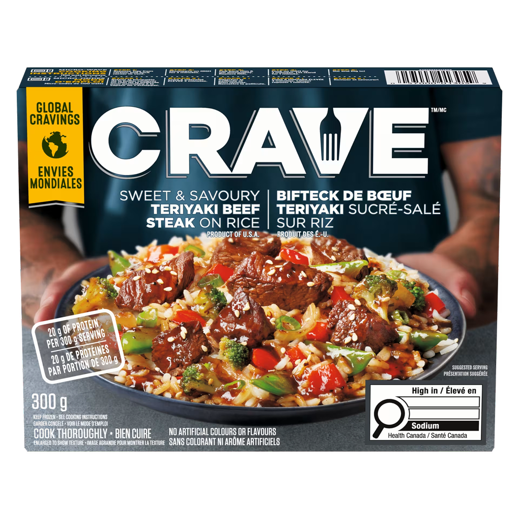 CRAVE Teriyaki Beef Steak on Rice frozen meal box with 20g protein and high sodium warning label.