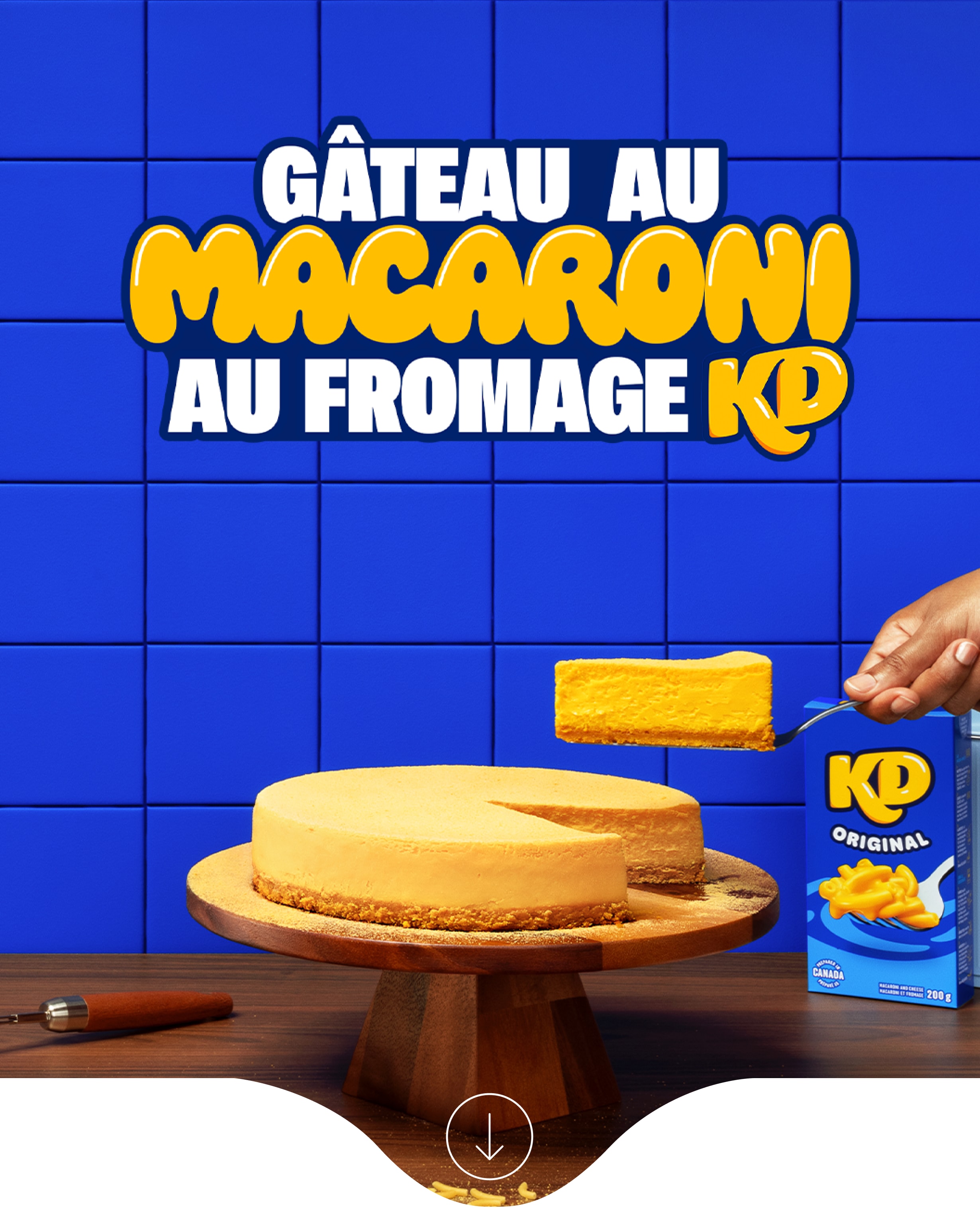 Le Mac and cheesecake de KDessert comprend un cheesecake à l'orange, un fouet et une boîte de Kraft Dinner.