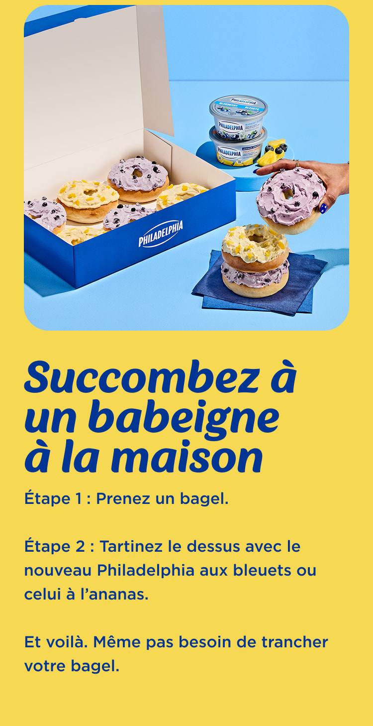 Une boîte de Babéignes Philadelphia, composées de bagels garnis de fromage à la crème Philadelphia aux bleuets et à l'ananas,