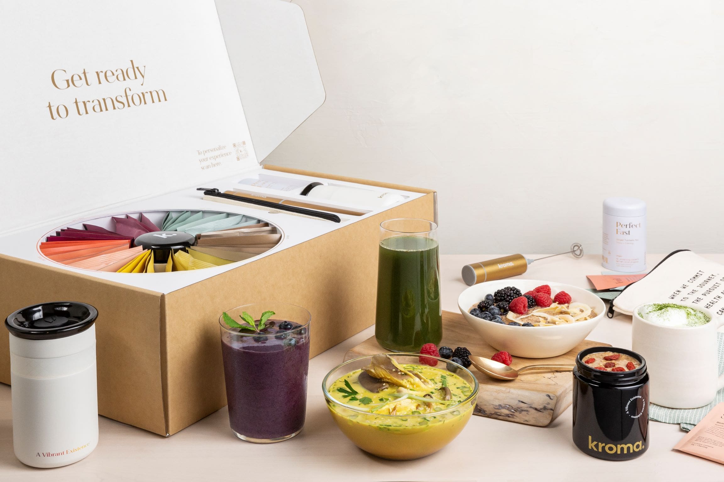 A Kroma 5-Day Deluxe Reset alongside a spread of food and accessories from the Reset.