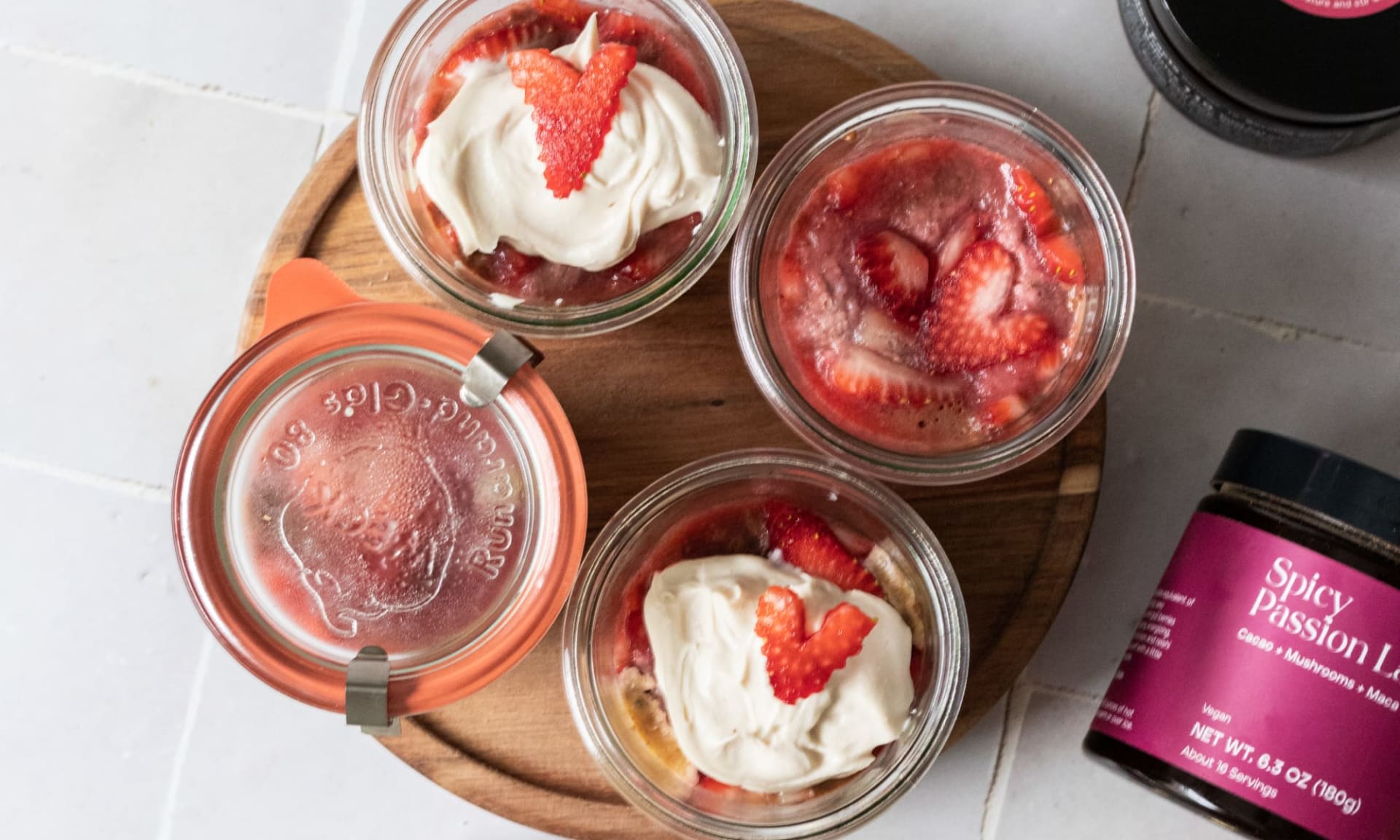 4 jars of Kroma Spicy Passion Chia Pudding with Strawberries.