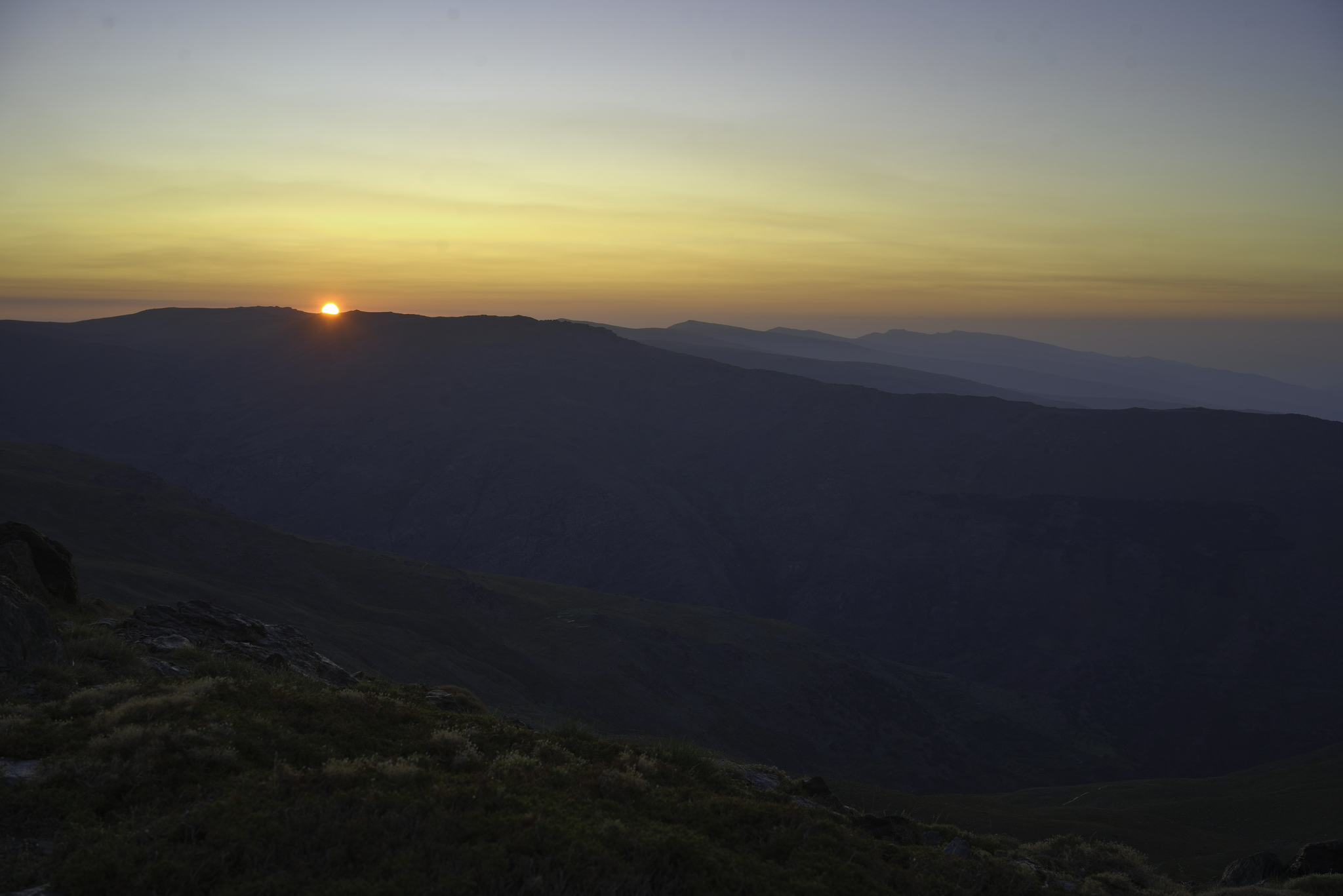 The sun rising over the eastern Sierra Nevada