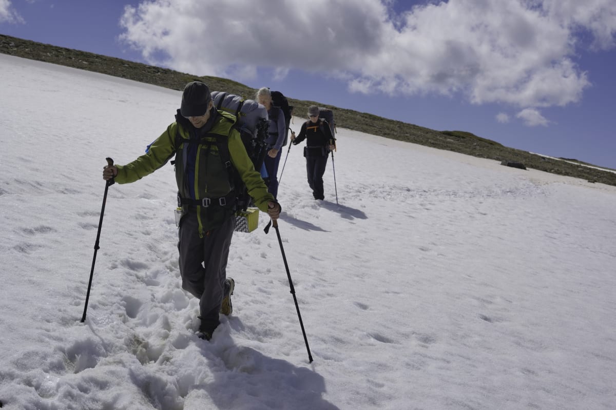 Crossing snow slopes into Lavaderos de la Reina
