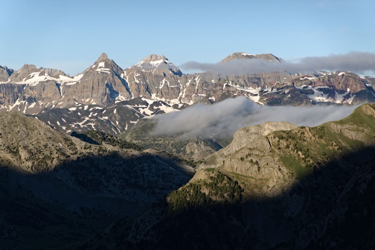 Morning sun over the mountains from camp