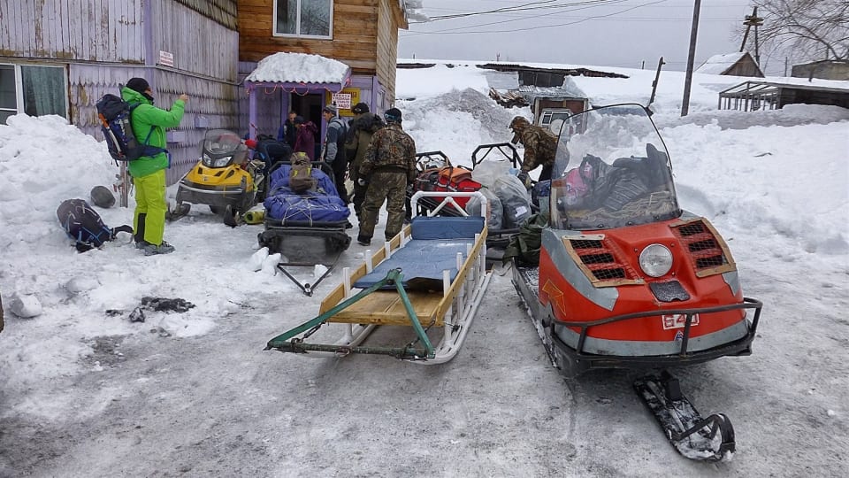 Packing up the snowmobiles