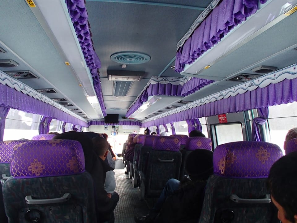 On the very purple bus for the next 10.5 hours