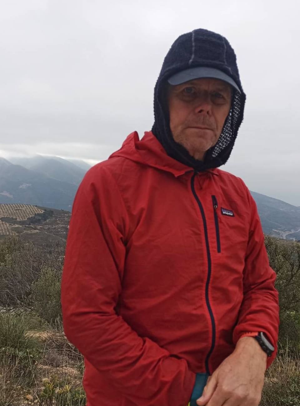 Core Hoodie hood up with Patagonia Houdini Windshirt