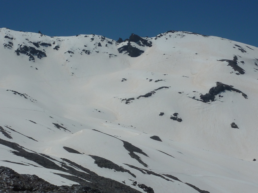 You can see the route ahead of us that goes just below the rocks on the skyline