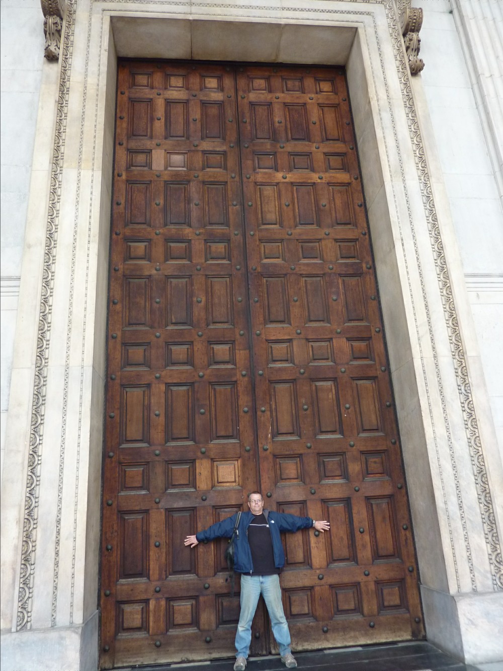 Why such big doors?? Richard stood showing the size of some doors at St Pauls Cathedral
