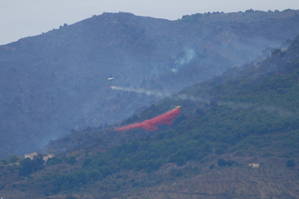 A helicopter and aeroplane hard at work