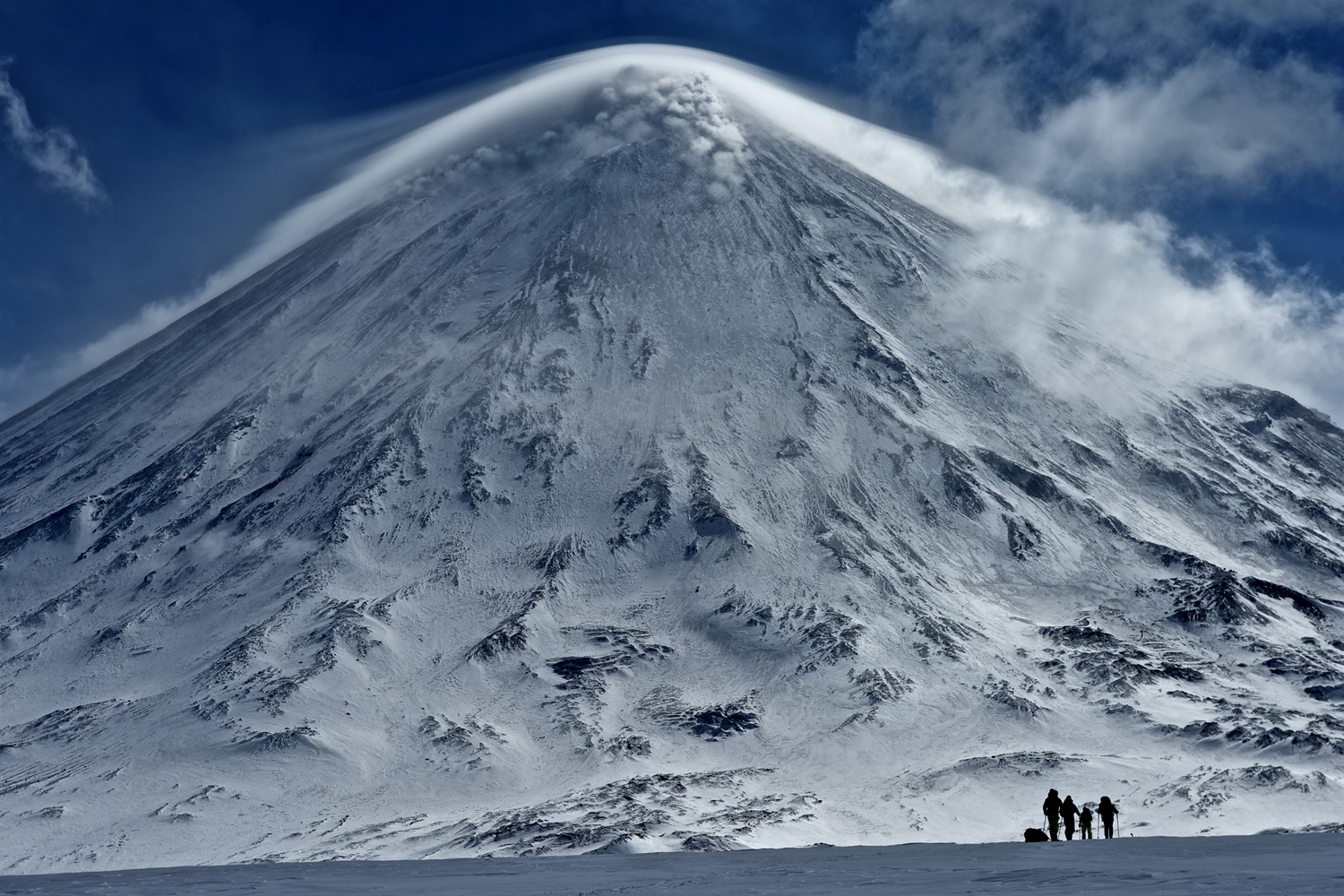 Doesn't seem right walking towards an erupting volcano. Photo courtesy of Martin Hartley