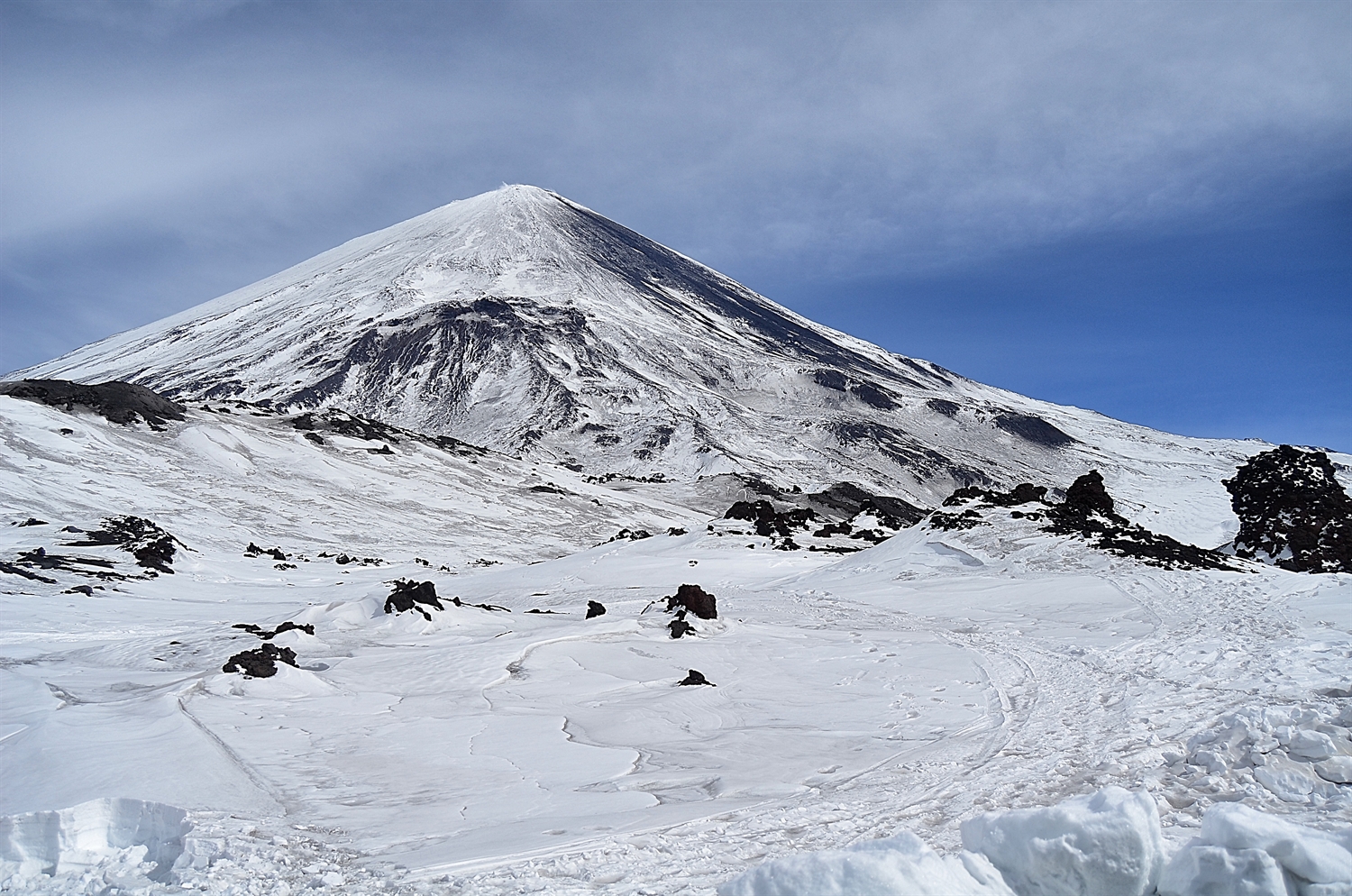 Kluchevskoi turning blacker and blacker and the snow around camp is starting to become contaminated by ashfall