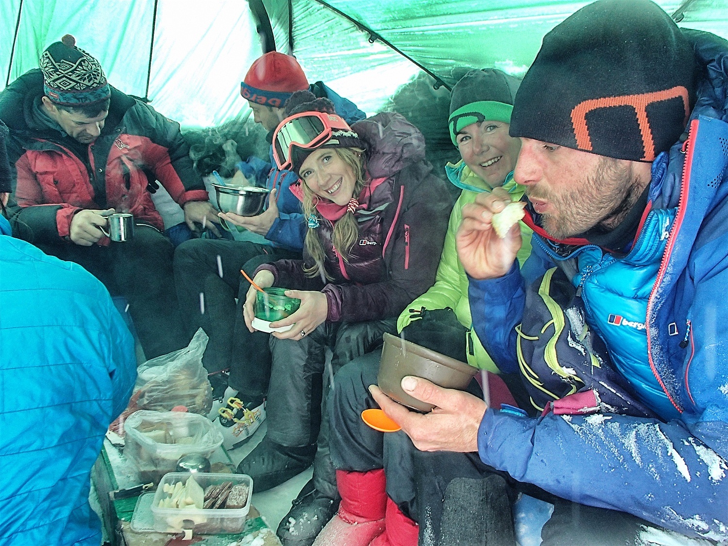 In the kitchen tent having dinner
