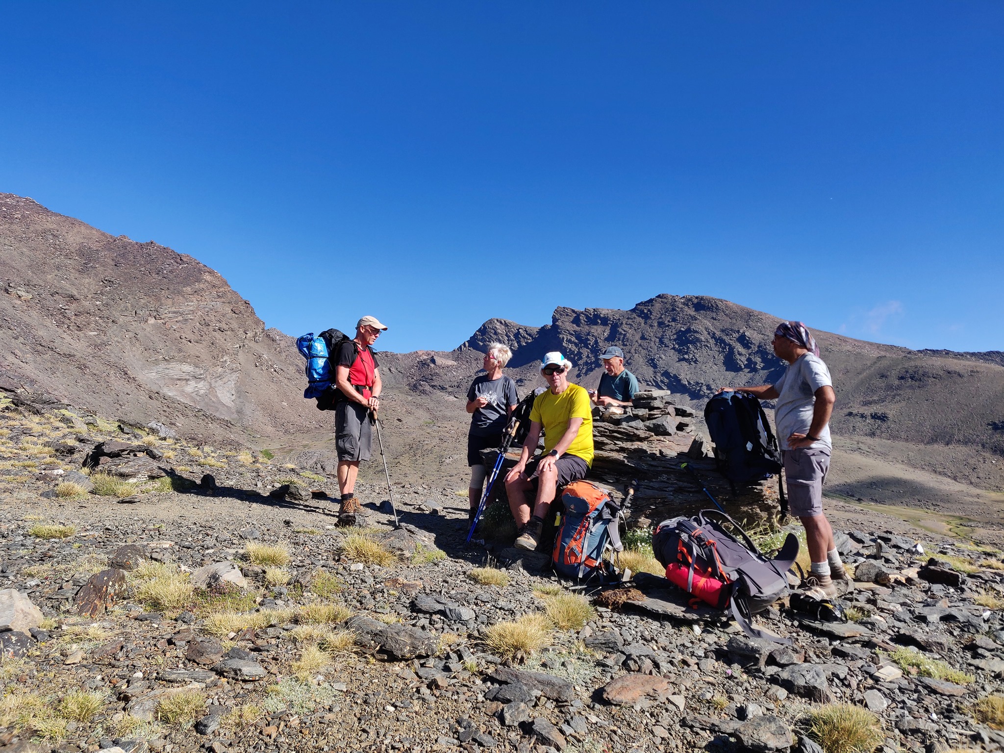 Taking a break having steeply climbed back out from Siete Lagunas. We came from somewhere over Alistairs shoulder