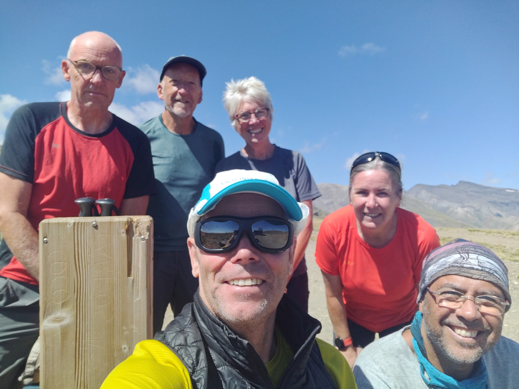 Waiting for our pick up and thankful that we able to catch the National Park bus rather than walk the long hot road back to the cars.