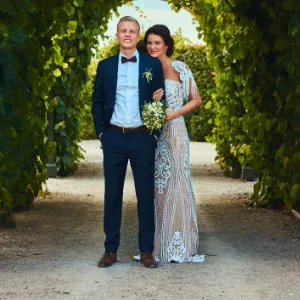 Image of bride and groom Lizzie & Henry on their wedding day