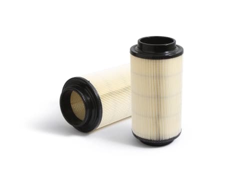 Two All Balls round air filters with cream pleated media and black end caps, one standing and one on its side