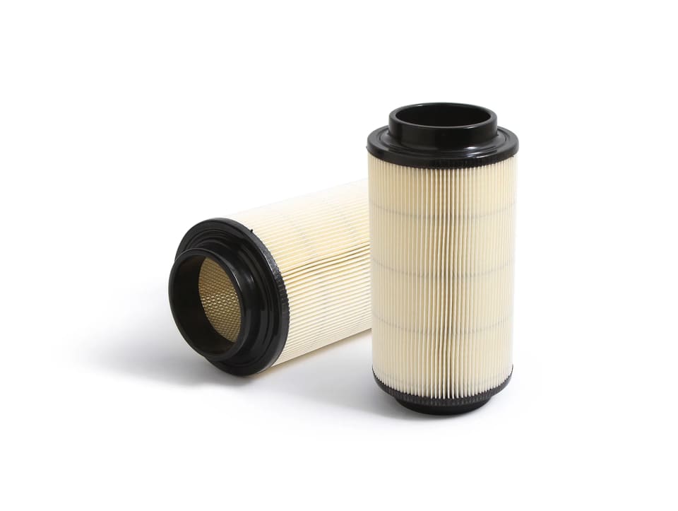 Two All Balls round air filters with cream pleated media and black end caps, one standing and one on its side