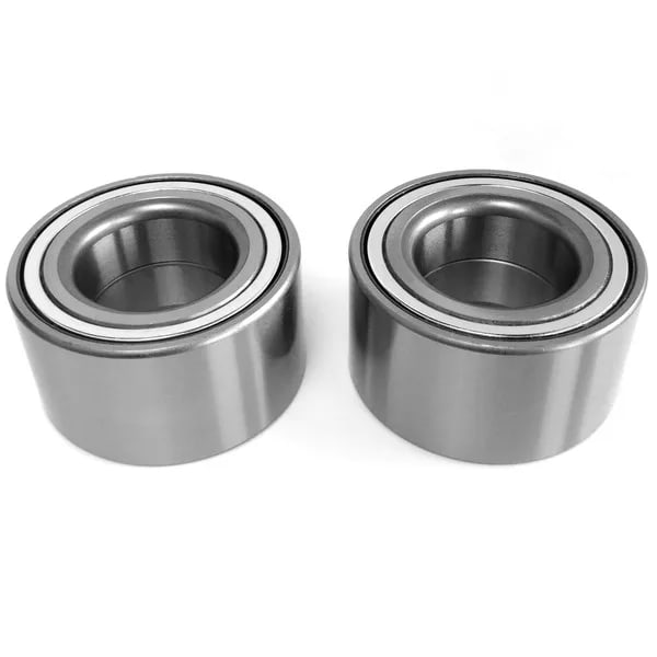 Two sealed steel wheel bearings side by side, shown at an angle on a white background.