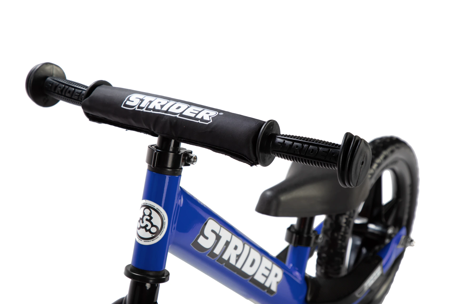 Close-up of blue Strider 12 Sport handlebars, grips, and handlebar pad