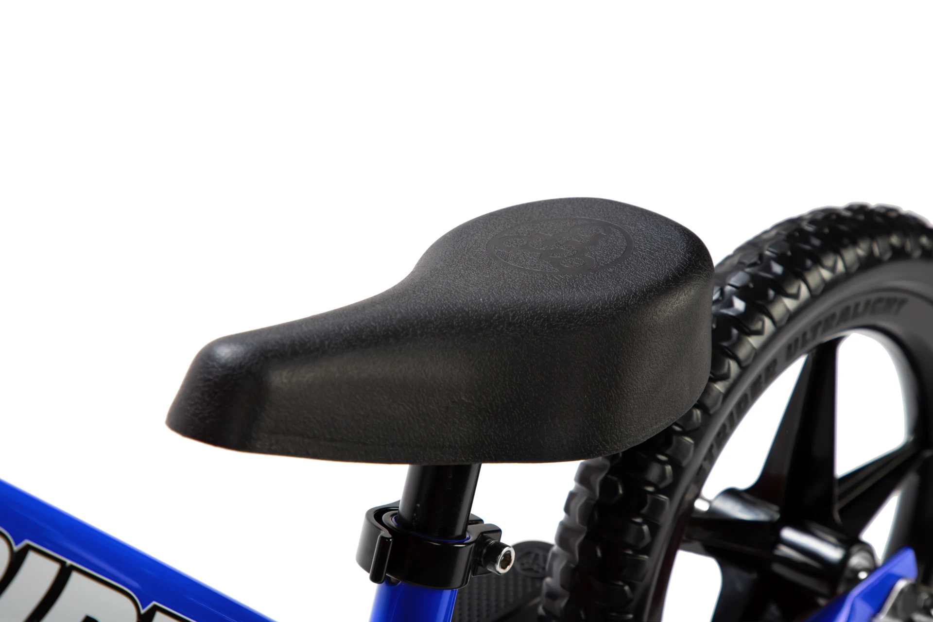 Close-up of the saddle on a blue Strider 12 Sport