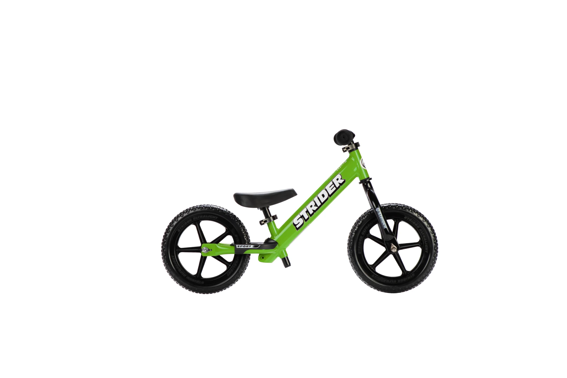 Strider 12 Sport balance bike in green, opposite-side view