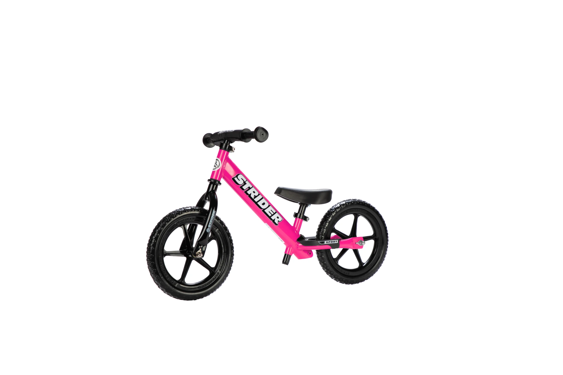 Strider 12 Sport balance bike in pink, front three-quarter view