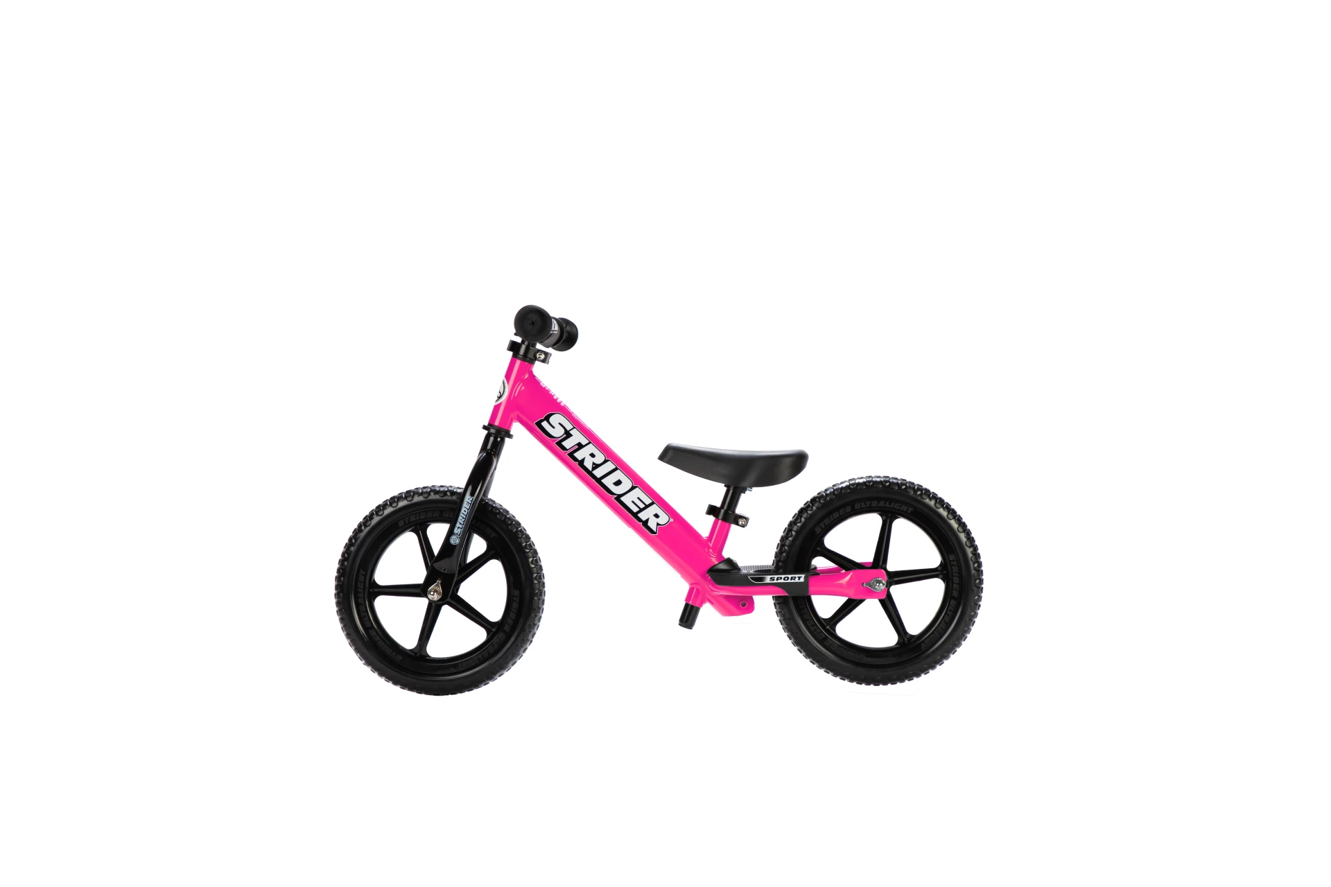 Strider 12 Sport balance bike in pink, side view