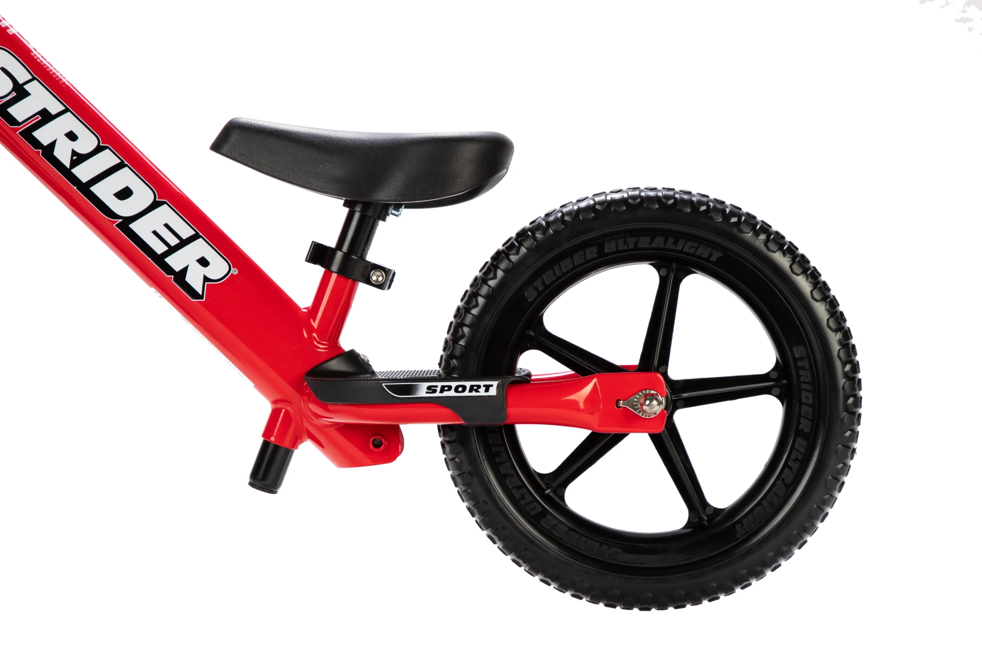 Red Strider 12 Sport saddle, footrest, and rear wheel