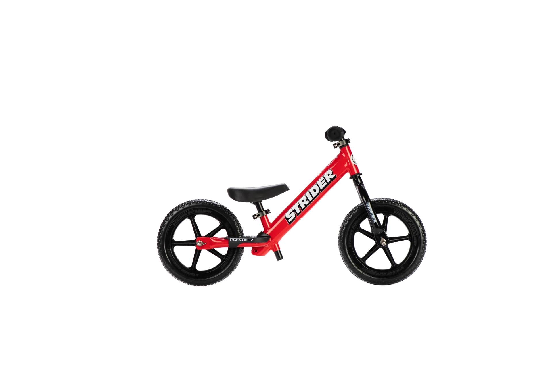 Strider 12 Sport balance bike in red, opposite-side view