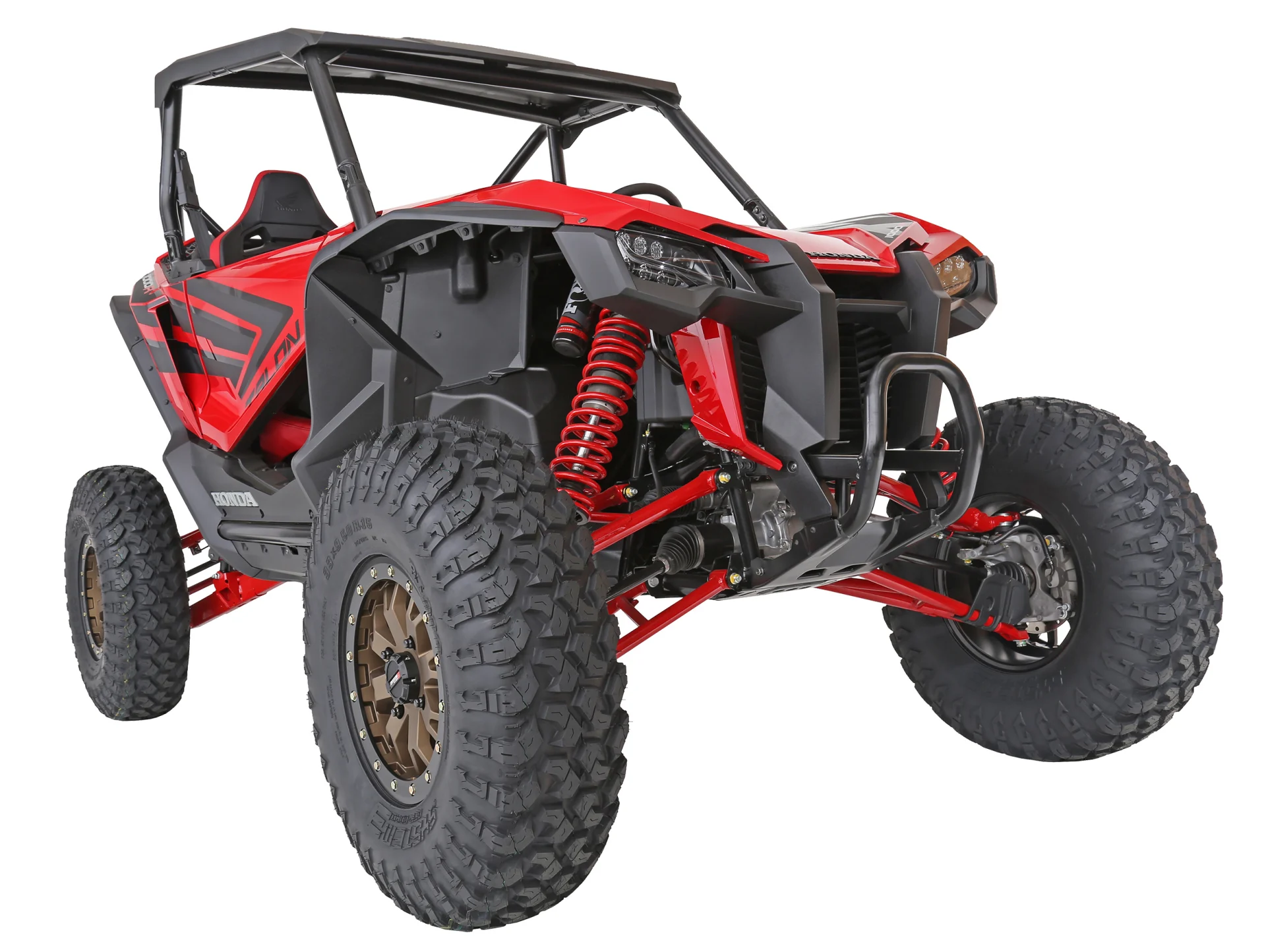 Red and black UTV viewed from the rear, showing tires and suspension