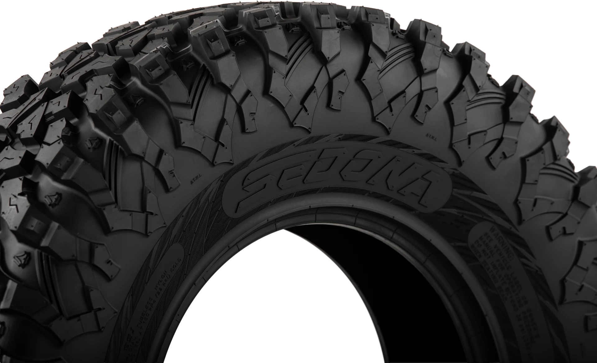 Close-up of Sedona branding and shoulder lugs on a Ridge Ripr tire