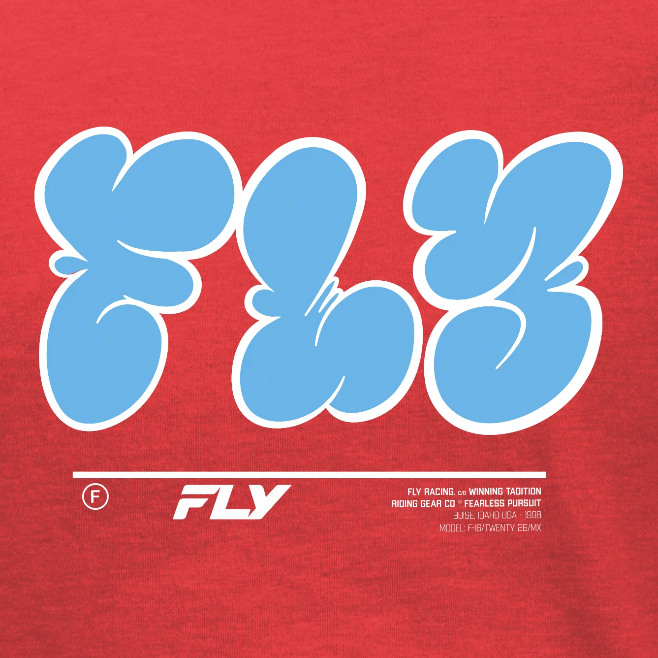 Close-up of the light blue bubble-letter Fly graffiti print on the red youth tee
