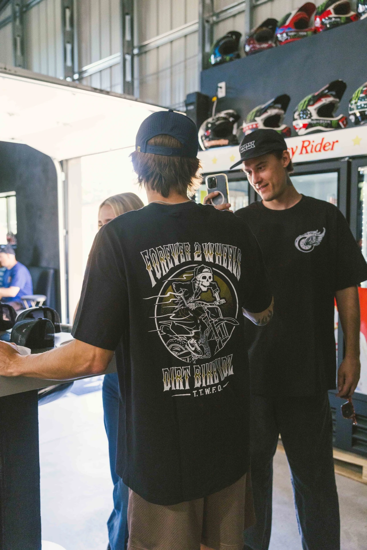 DBK Ghost Rider Tee in black worn at a race track, back view