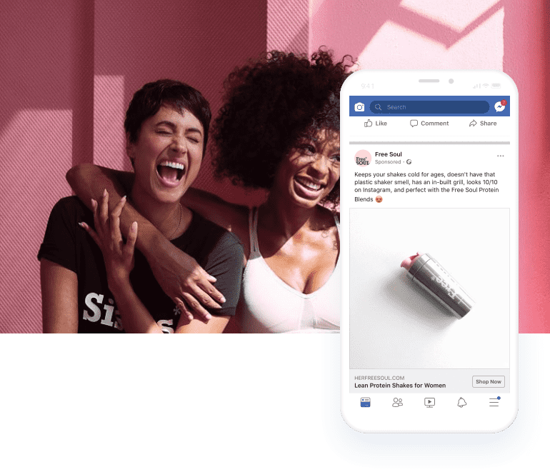 Two people laughing with white smart phone showing the Her Free Soul Faceook advert.