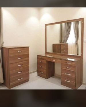 Bed with dressing mirror