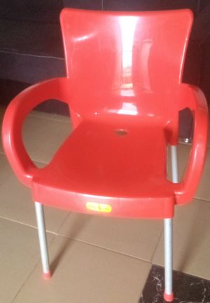 Plastic chair with iron leg