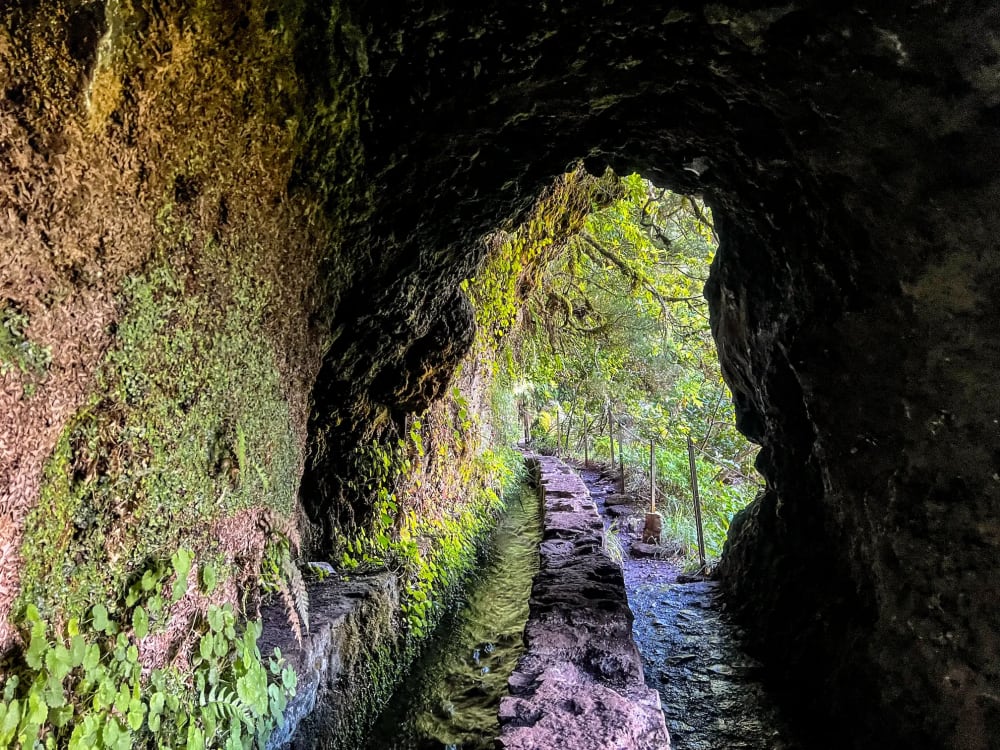 A tunnel through a mountain at Levada do Caldeirão Verde, PR9, on Madeira Island