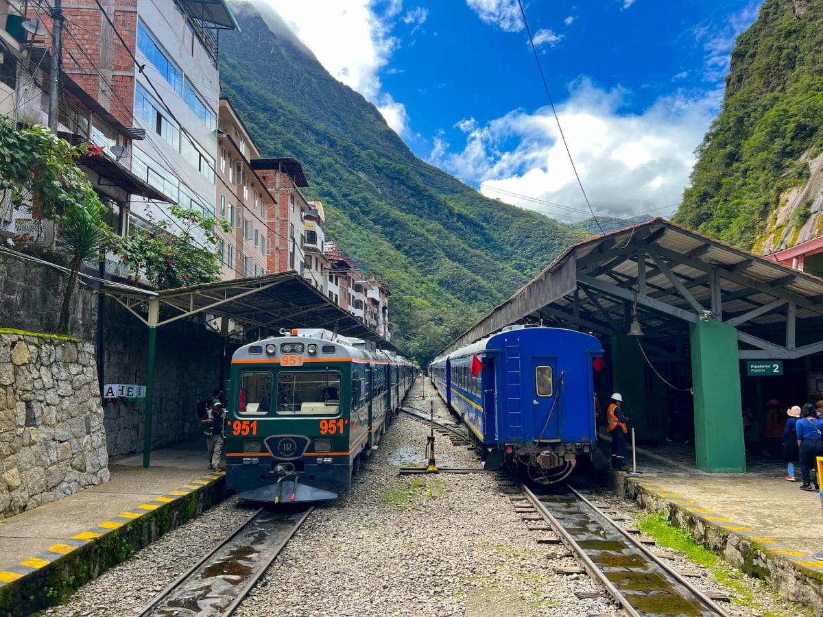 IncaRail and PeruRail trains in Aguas Calientes, Peru